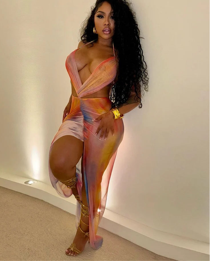 Slit Happens: Gradient Halter Maxi”.