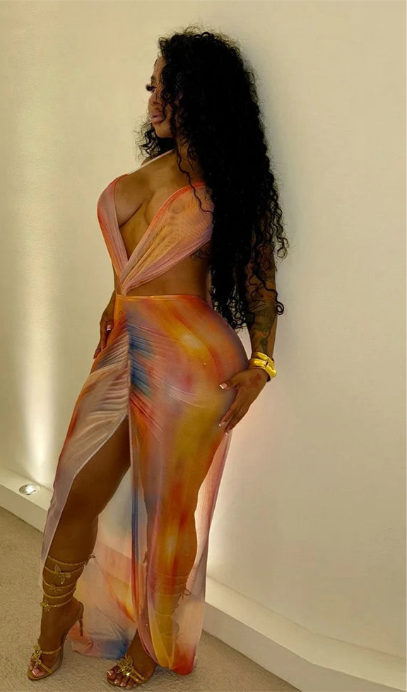 Slit Happens: Gradient Halter Maxi”.
