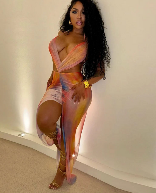 Slit Happens: Gradient Halter Maxi”.