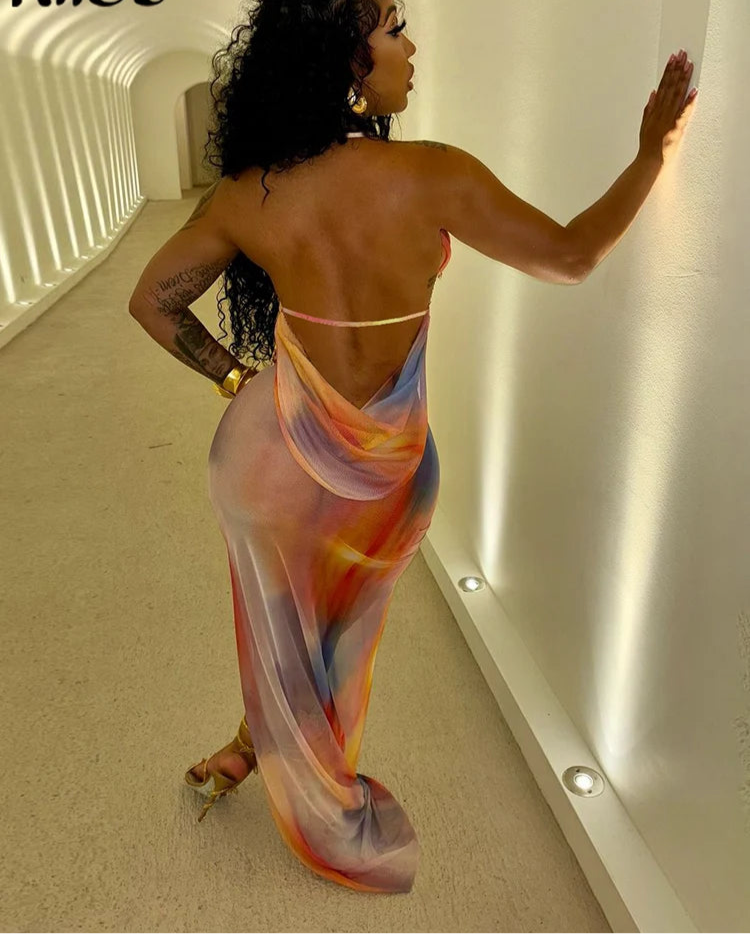 Slit Happens: Gradient Halter Maxi”.